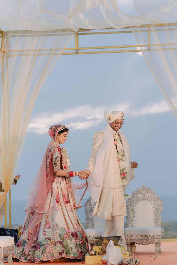 Bride and groom posing during a luxury destination wedding shoot by KB Studio Productions at a scenic location.