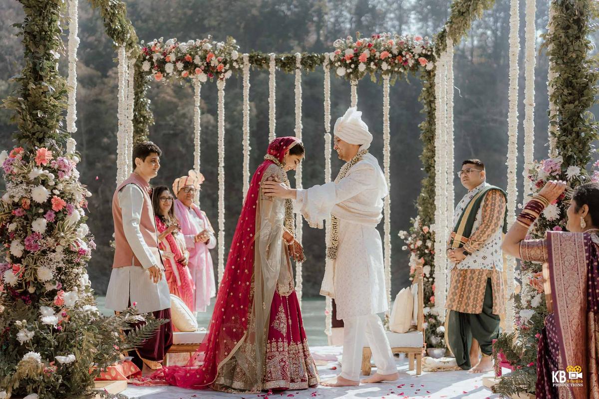 Bride and groom in a minimalist wedding setting captured with soft natural light by KB Studio Productions