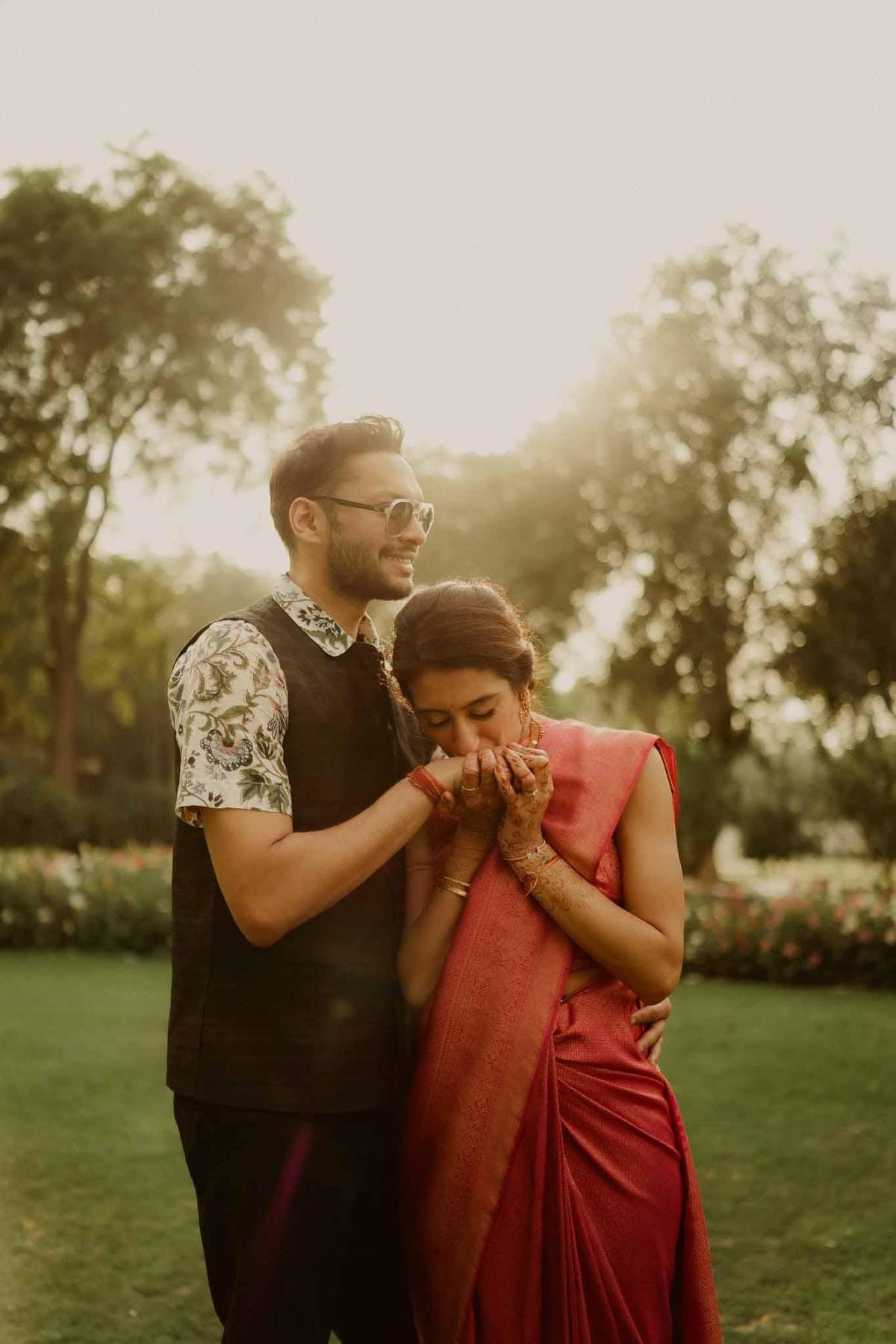 Pre wedding photography in Delhi featuring a candid couple moment in elegant wedding attire captured by KB Studio Productions