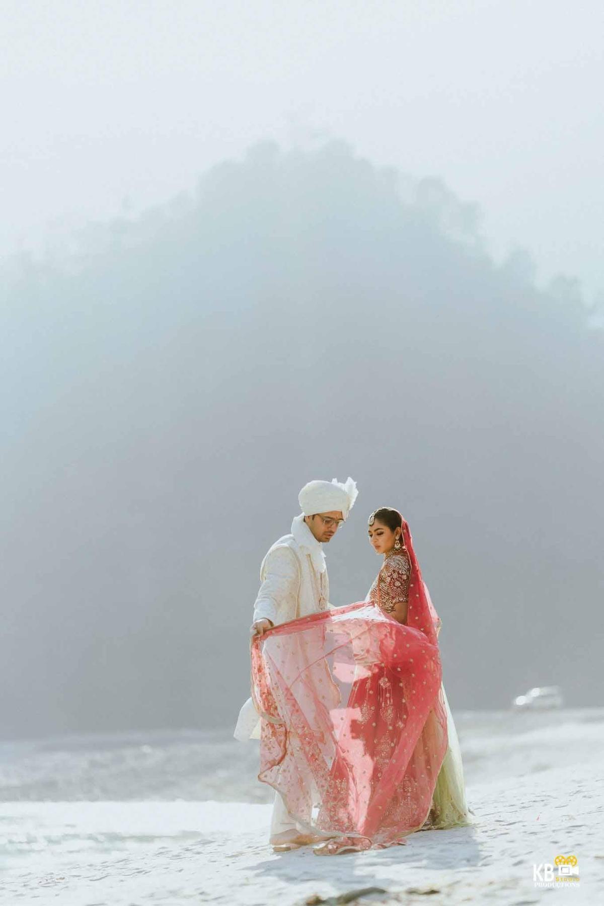 Wedding photographers in Nainital capturing a romantic couple moment at a scenic hilltop venue