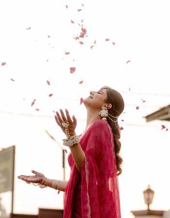 Wedding photography in Gurugram featuring candid bride moment during luxury wedding photoshoot in Gurugram