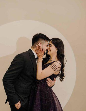 Romantic close-up portrait of a couple during their engagement ceremony in Delhi captured by professional photographers.