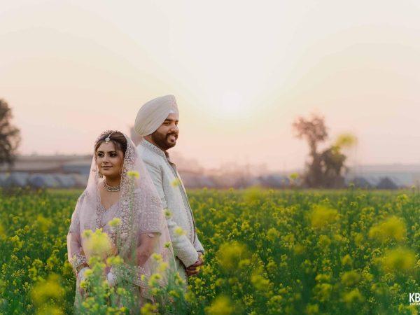 Punjabi couple in traditional attire during their cinematic destination wedding in Ludhiana captured by KB Studio Productions