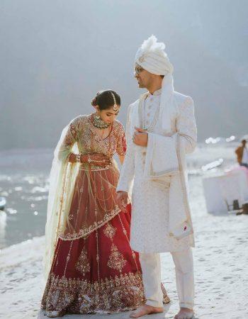 Pre wedding couple shoot in Rishikesh with bride and groom in elegant wedding attire